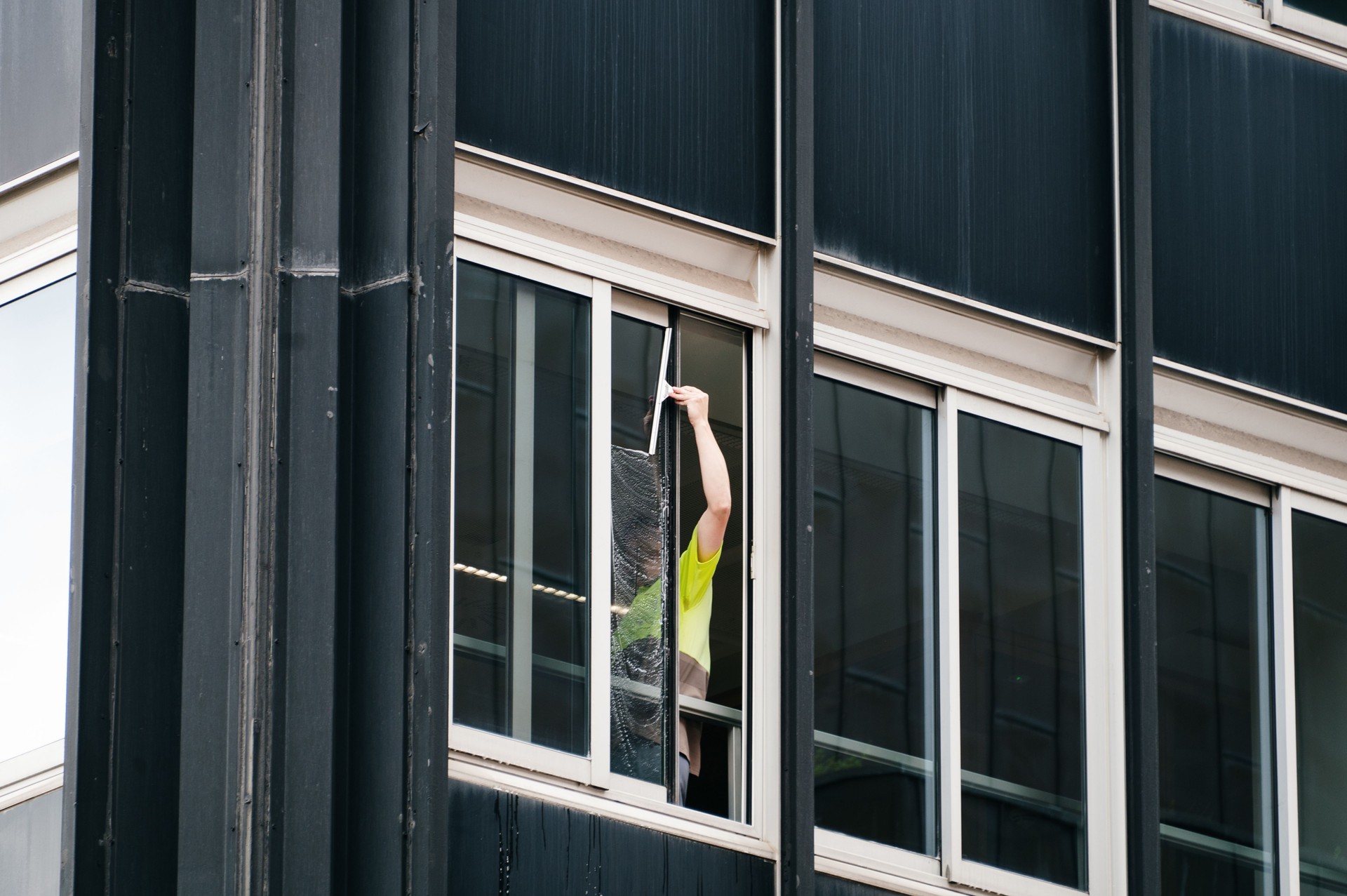 Cleaning office building windows